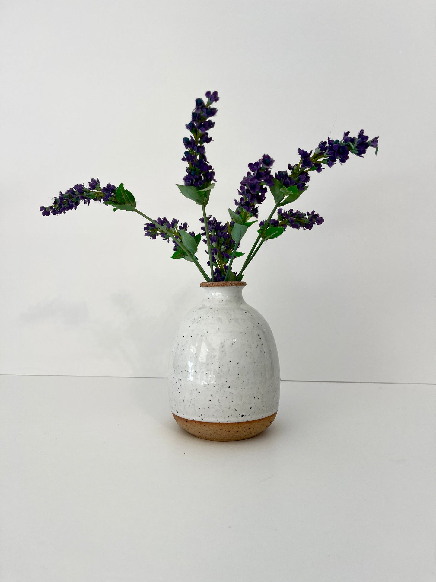 White Speckled Round Bud Vase with Raw Base