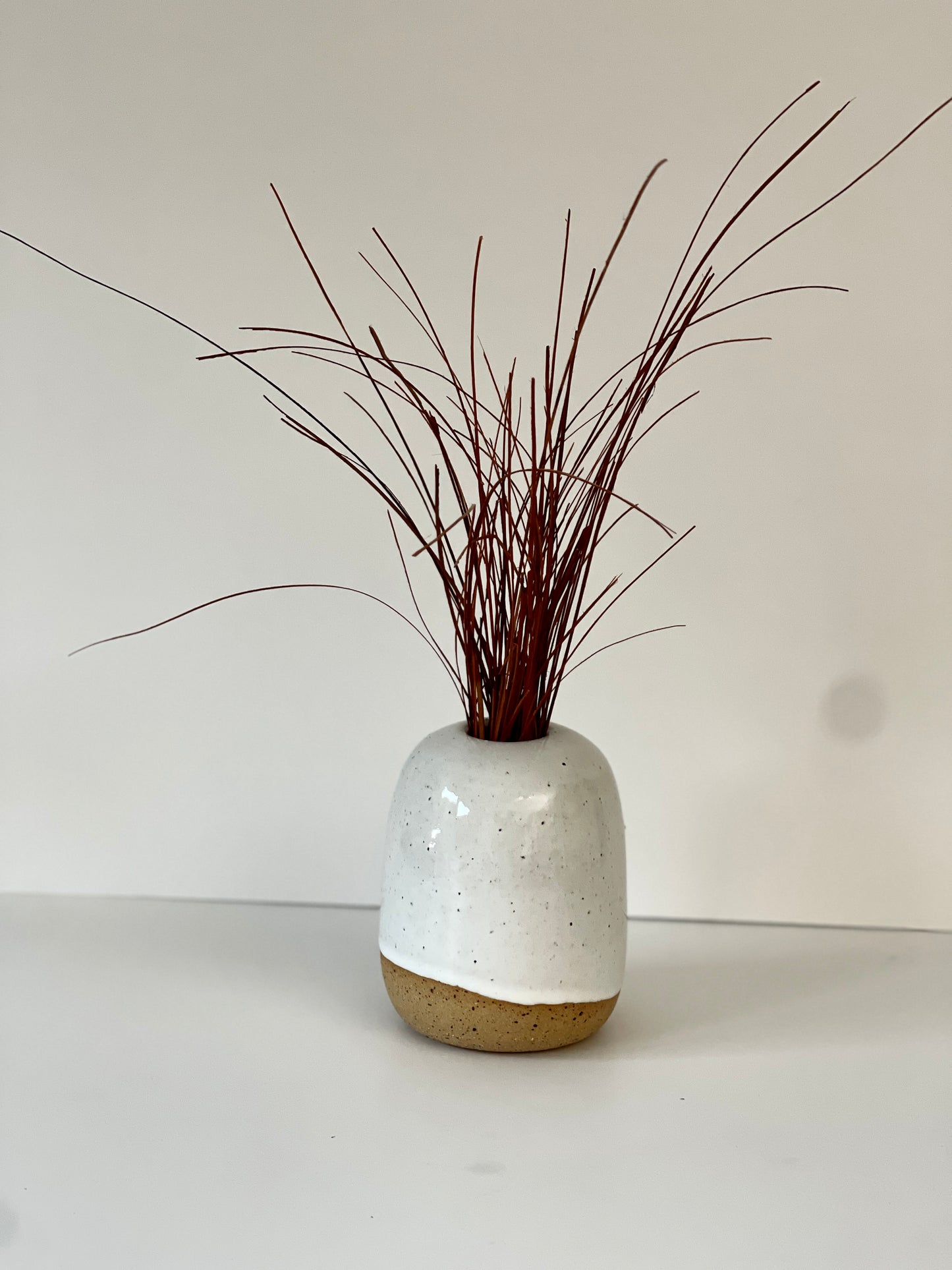 White Bud Vase on Speckled Clay with Raw base